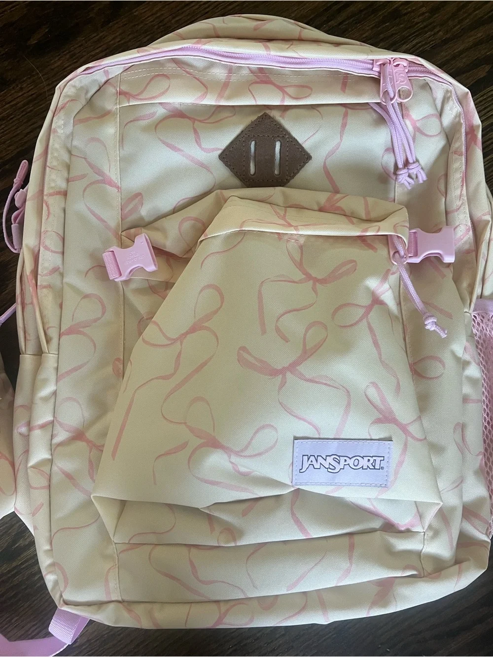 Jansport Cream Backpack with Pink Ribbon Print and Pouch